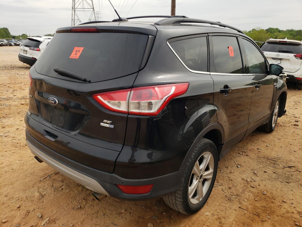 Photo 4 from auction – 2014 FORD ESCAPE SE with VIN 1FMCU9GX5EUA26811