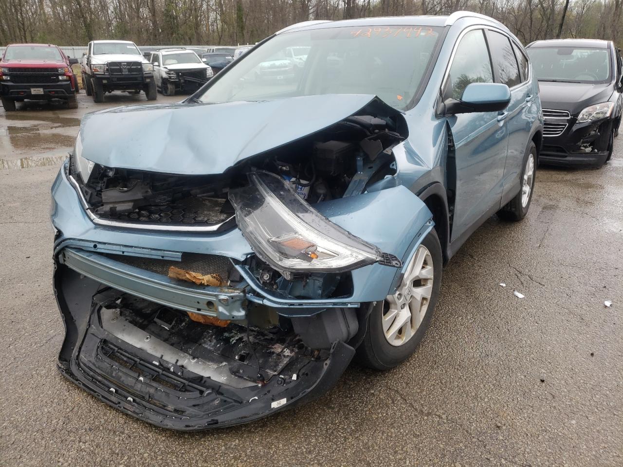 Photo 2 from auction – 2016 HONDA CR-V EXL with VIN 2HKRM4H70GH708007