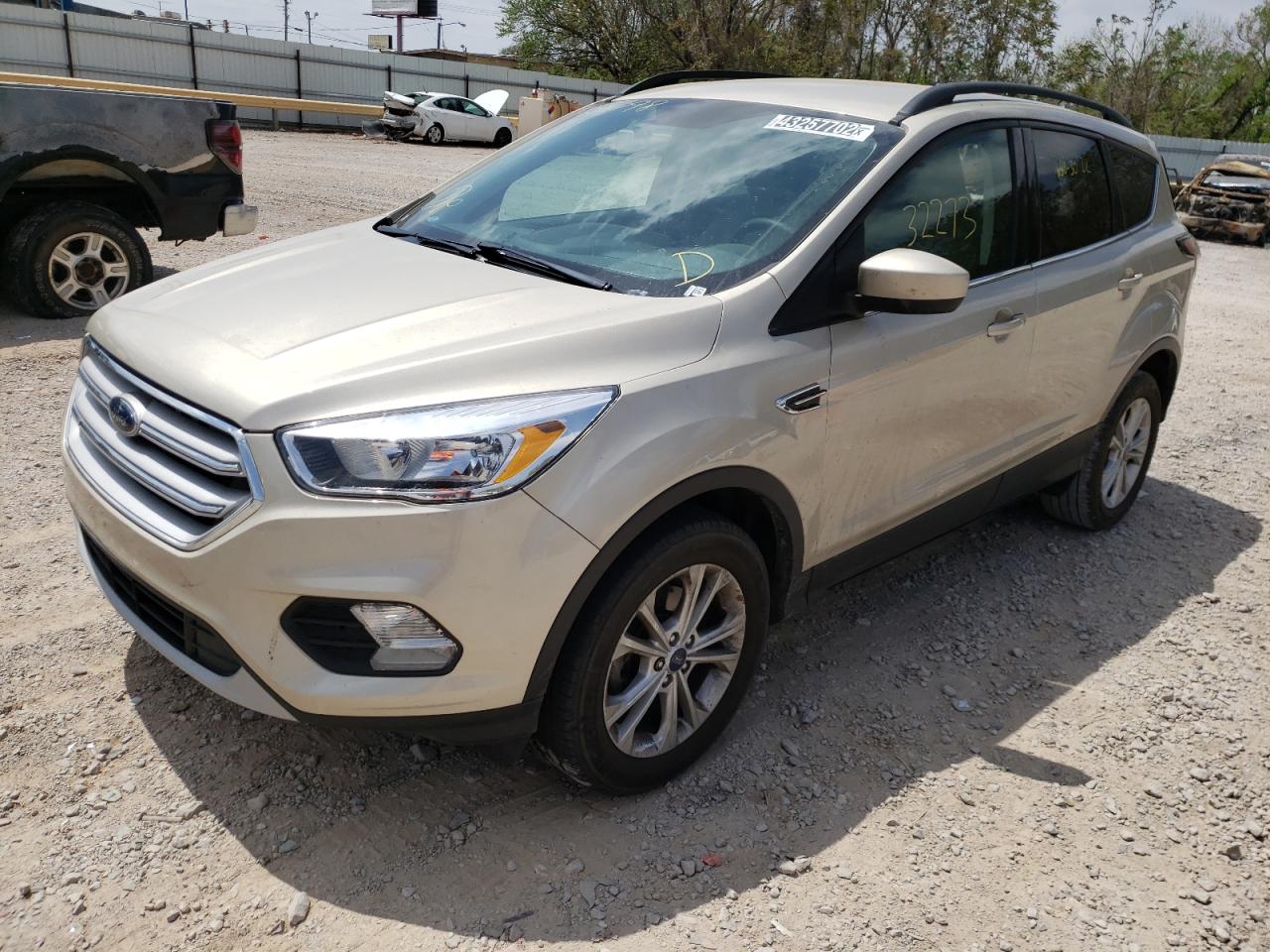Photo 2 from auction – 2018 FORD ESCAPE SE with VIN 1FMCU0GD4JUC58098