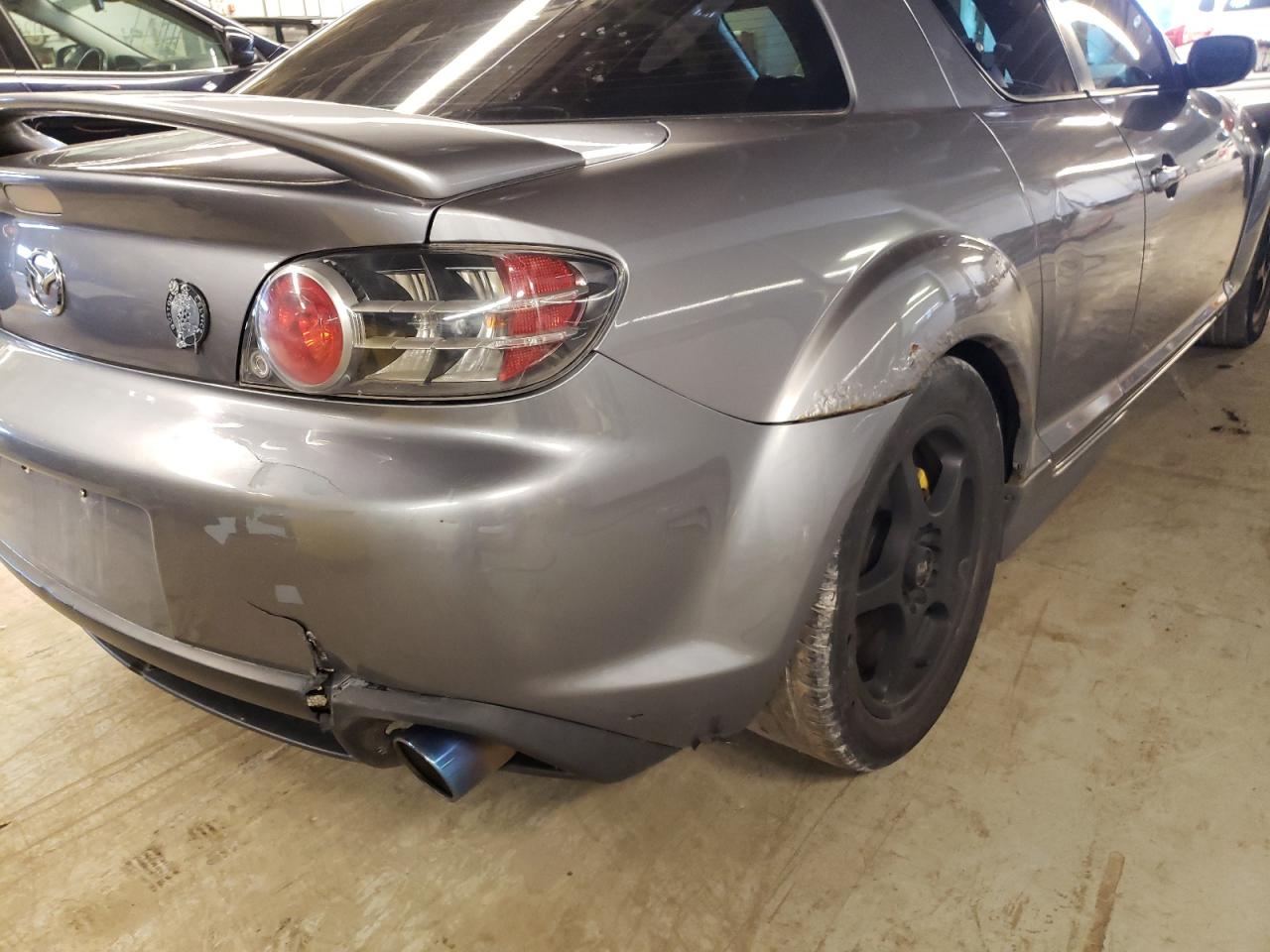 Photo 9 from auction – 2004 MAZDA RX8 with VIN JM1FE173240115917