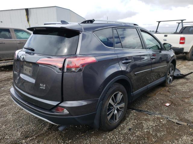 Photo 4 from auction – 2016 TOYOTA RAV4 XLE with VIN 2T3RFREV7GW499643