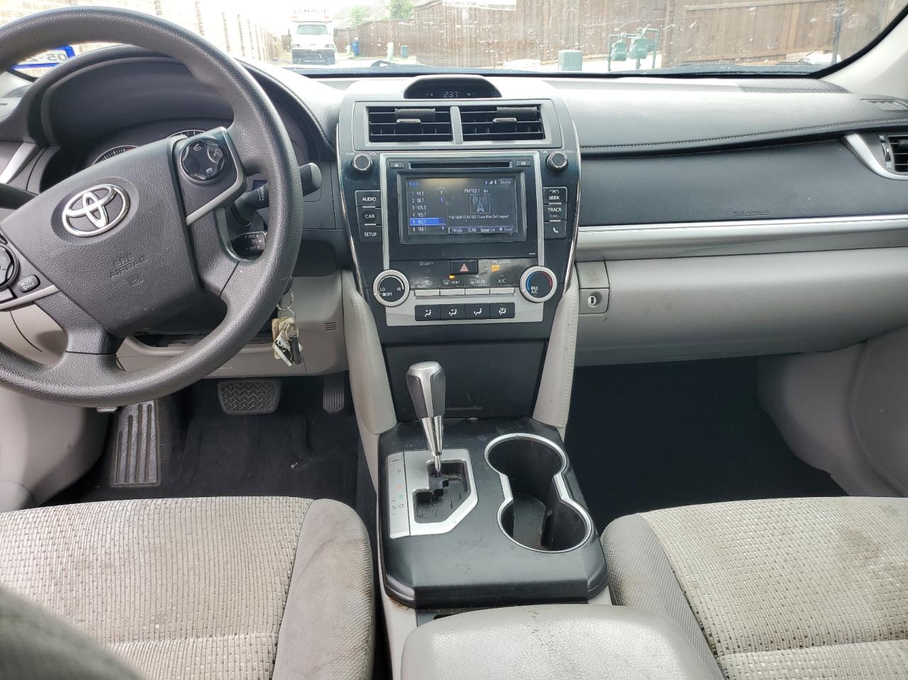 Photo 9 from auction – 2014 TOYOTA CAMRY L with VIN 4T4BF1FK7ER418756