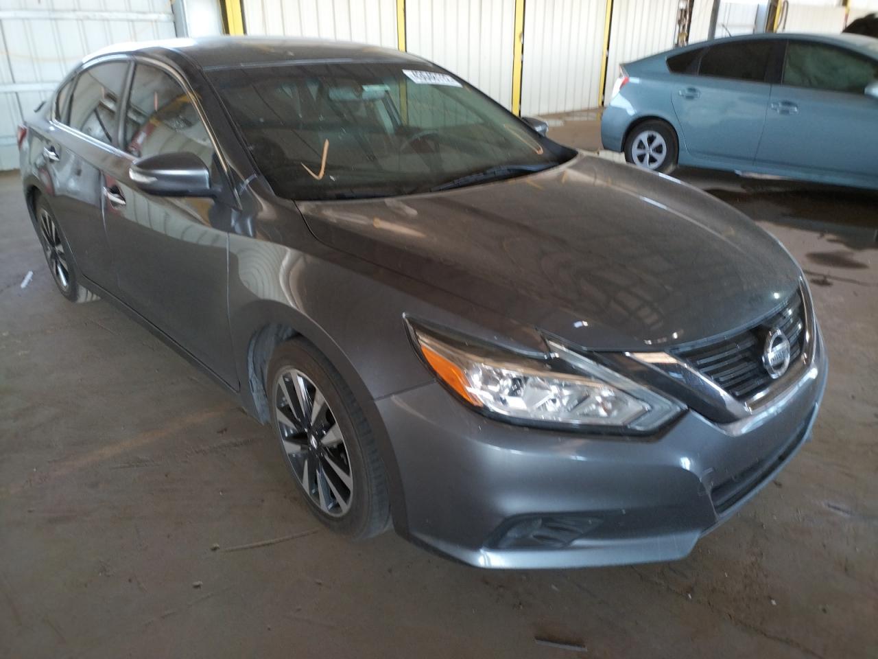 NISSAN ALTIMA 2.5 2018 with VIN 1N4AL3AP1JC143201 - Photo from auction