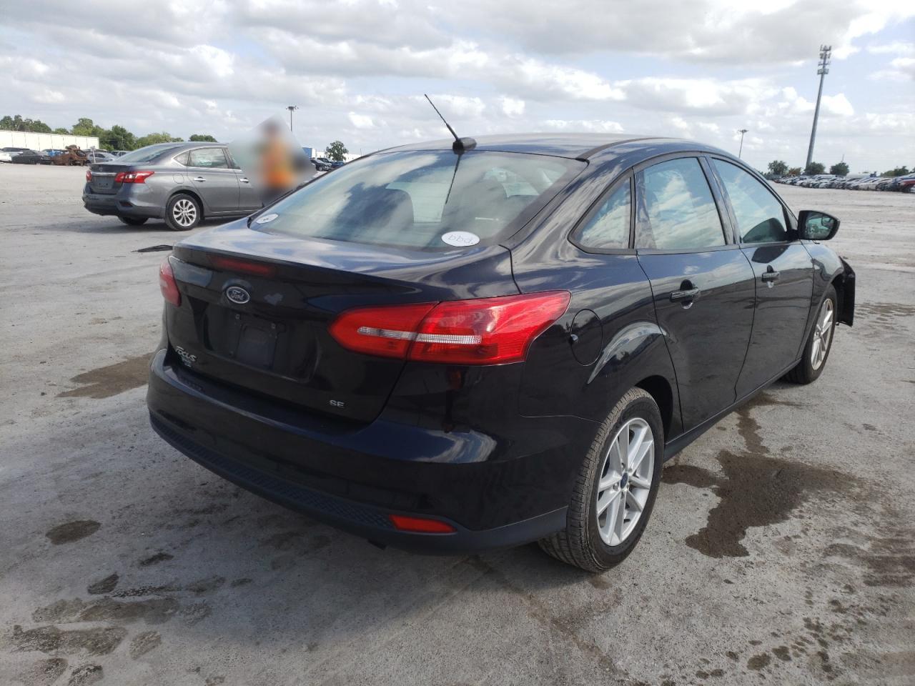 Photo 4 from auction – 2018 FORD FOCUS SE with VIN 1FADP3F23JL250376