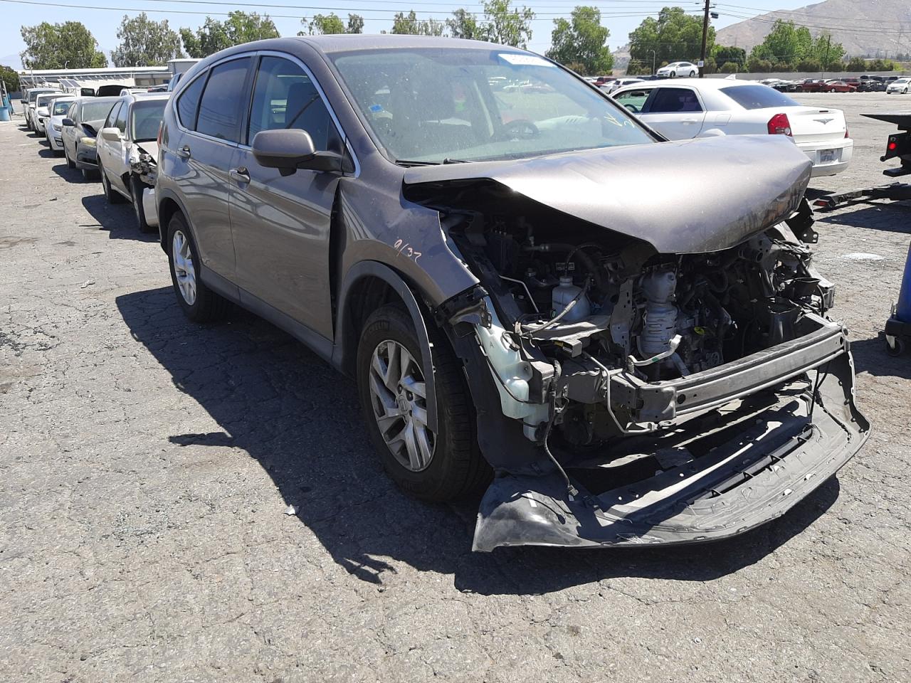 Photo 1 from auction – 2015 HONDA CR-V EX with VIN 3CZRM3H58FG709576