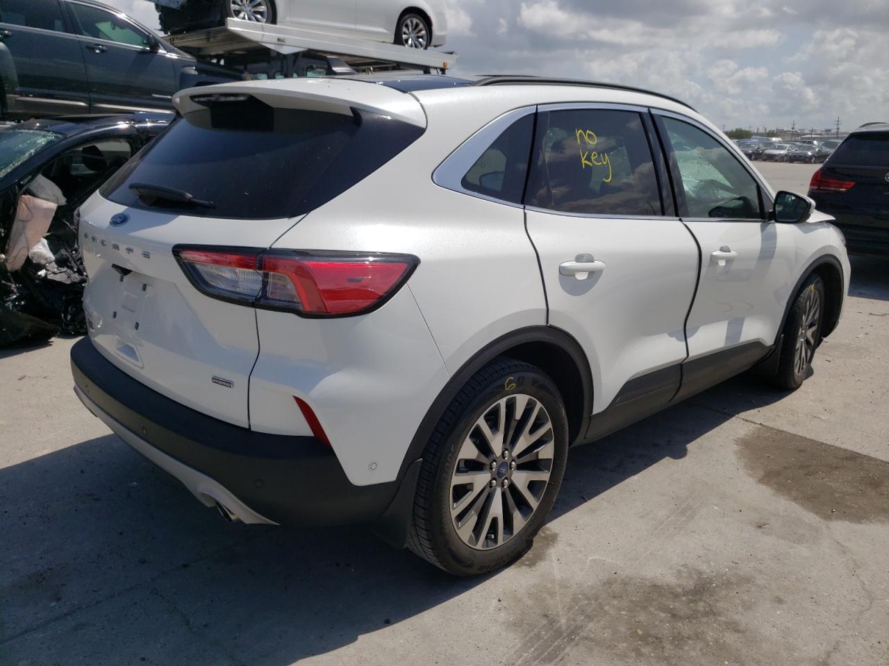 Photo 13 from auction – 2020 FORD ESCAPE TIT with VIN 1FMCU0DZ1LUA84994