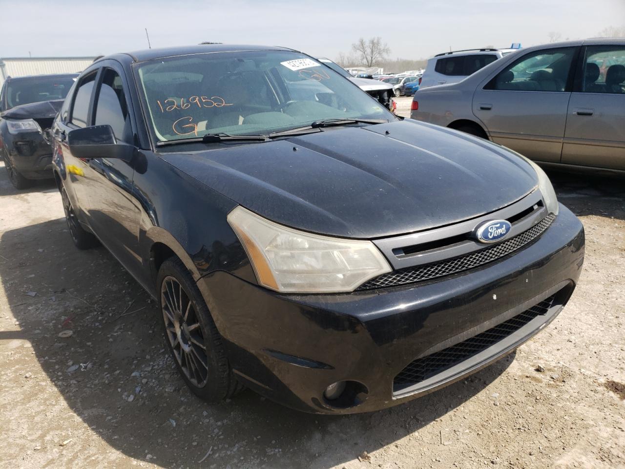 FORD FOCUS SES 2011 with VIN 1FAHP3GN4BW126952 - Photo from auction