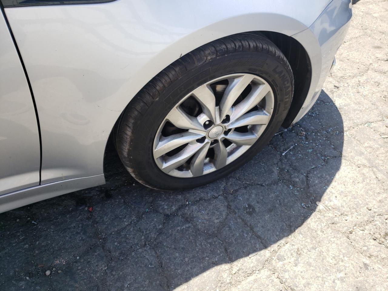Photo 9 from auction – 2014 KIA OPTIMA LX with VIN 5XXGM4A79EG328819