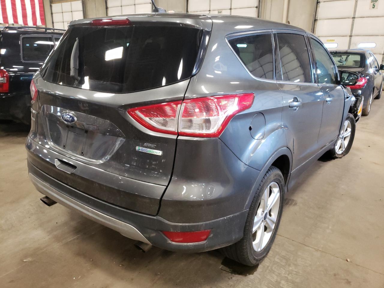 Photo 4 from auction – 2015 FORD ESCAPE SE with VIN 1FMCU0G98FUC25950