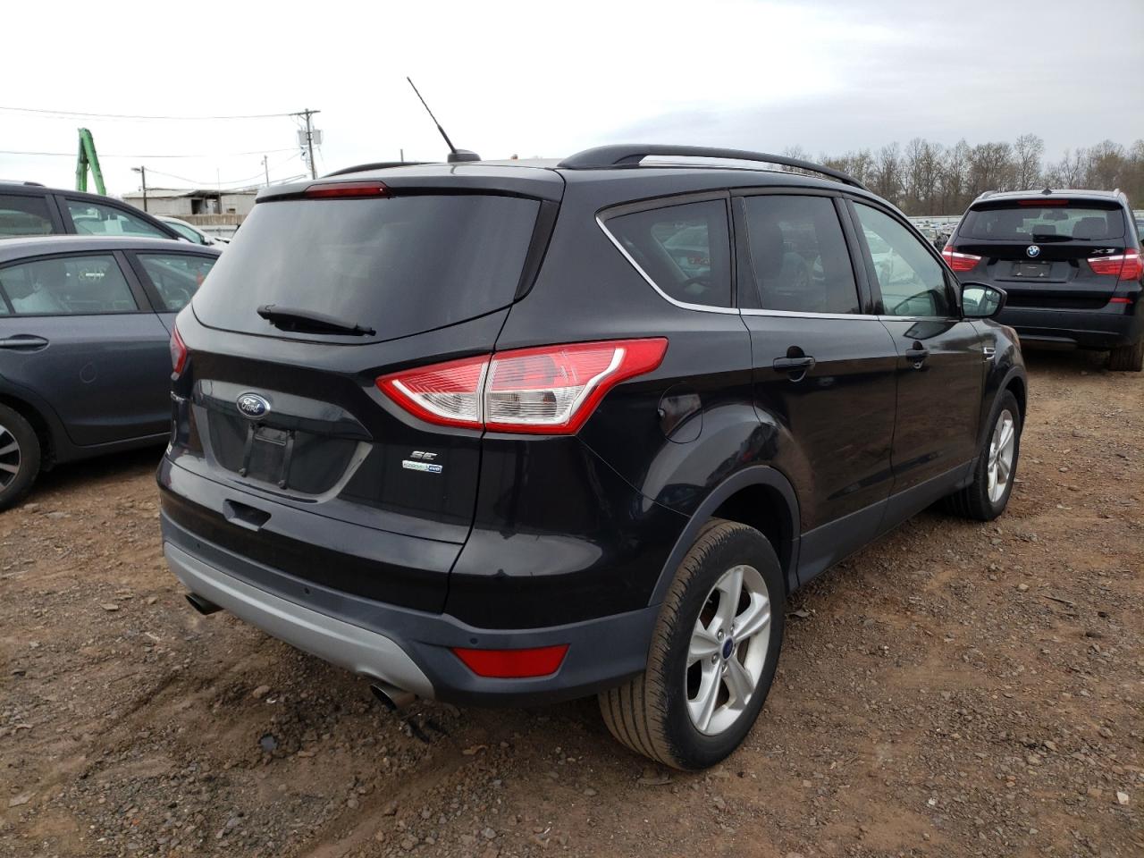 Photo 4 from auction – 2014 FORD ESCAPE SE with VIN 1FMCU9G9XEUE45481