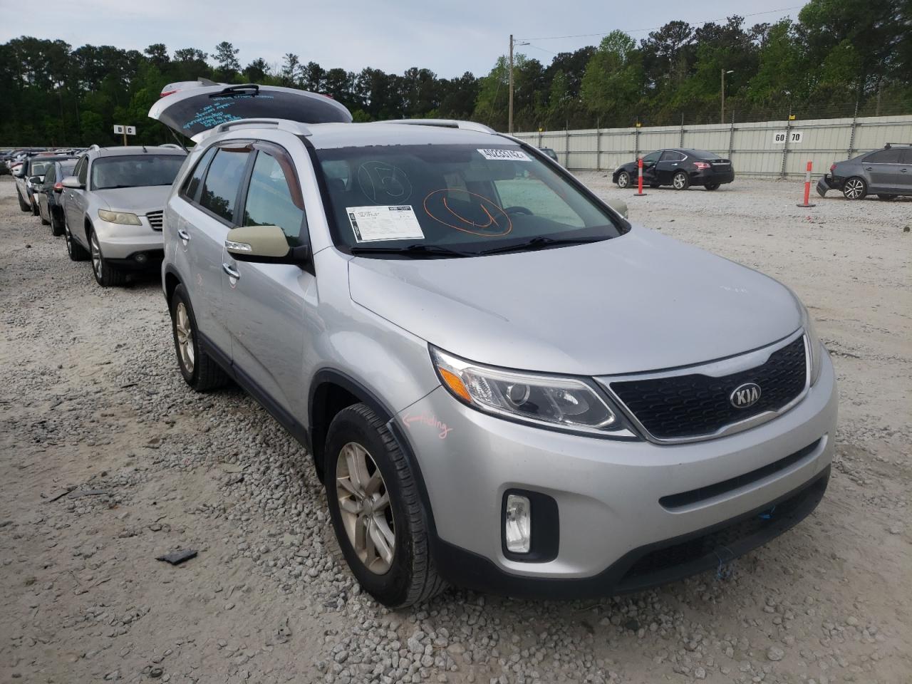 KIA SORENTO 2015 with VIN 5XYKT4A79FG572707 - Photo from auction
