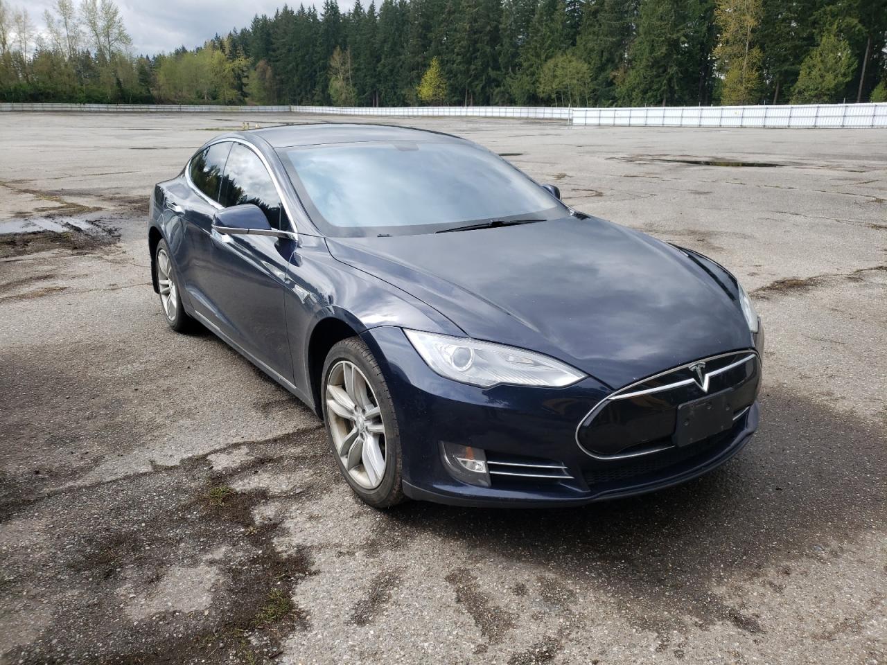 TESLA MODEL S 2013 with VIN 5YJSA1AC4DFP10241 - Photo from auction