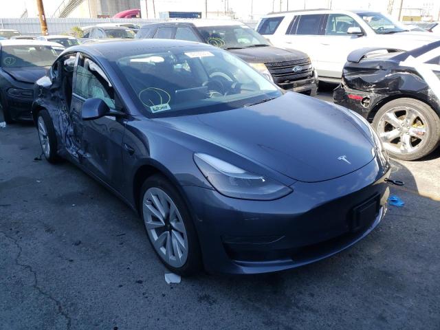 TESLA MODEL 3 2022 with VIN 5YJ3E1EA9NF142975 - Photo from auction
