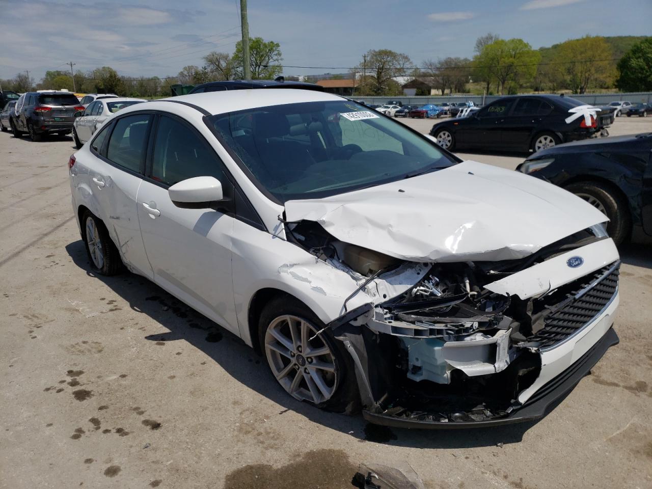 Photo 9 from auction – 2018 FORD FOCUS SE with VIN 1FADP3F22JL291310