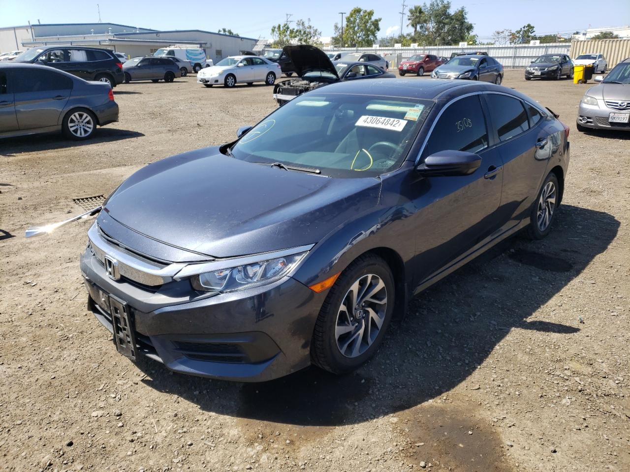 Photo 2 from auction – 2017 HONDA CIVIC EX with VIN 2HGFC2F74HH541319
