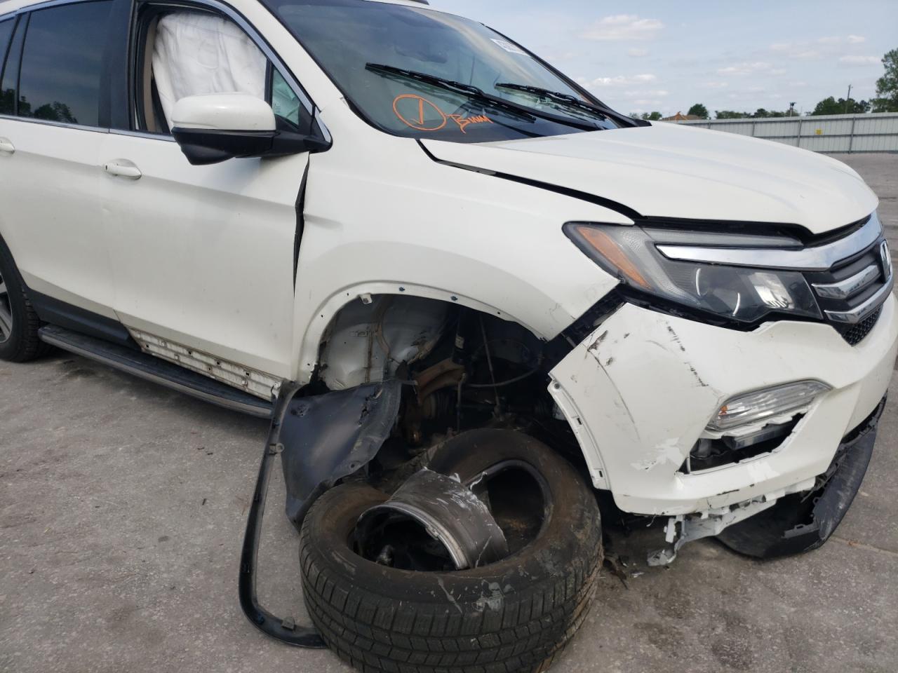 Photo 9 from auction – 2016 HONDA PILOT EXL with VIN 5FNYF6H86GB052436