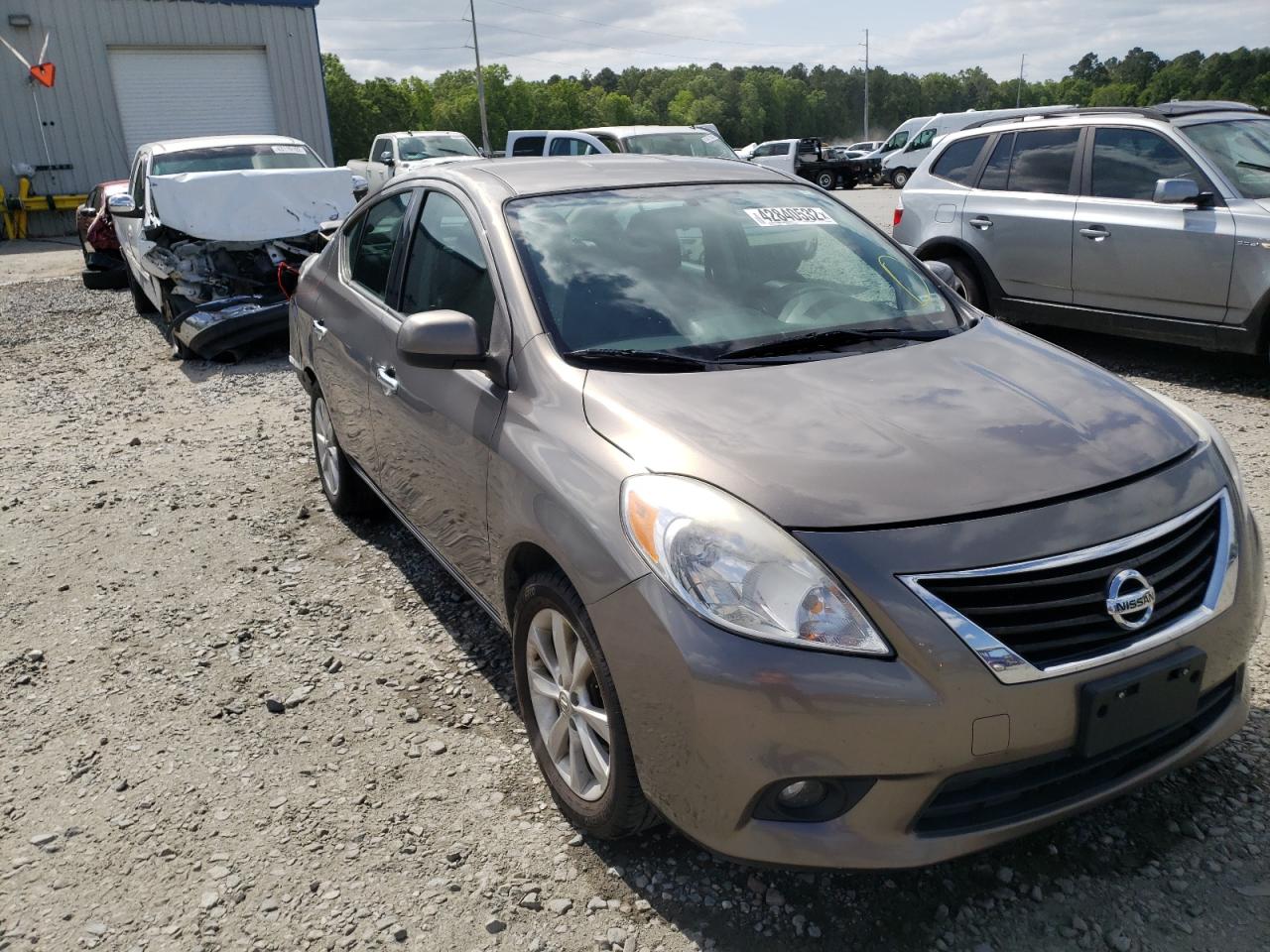NISSAN VERSA S 2014 with VIN 3N1CN7AP9EL843033 - Photo from auction