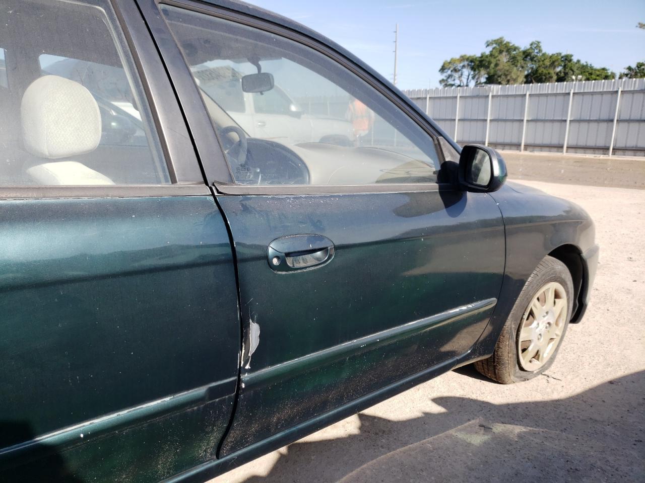 Photo 9 from auction – 2003 KIA SPECTRA BA with VIN KNAFB121035271225