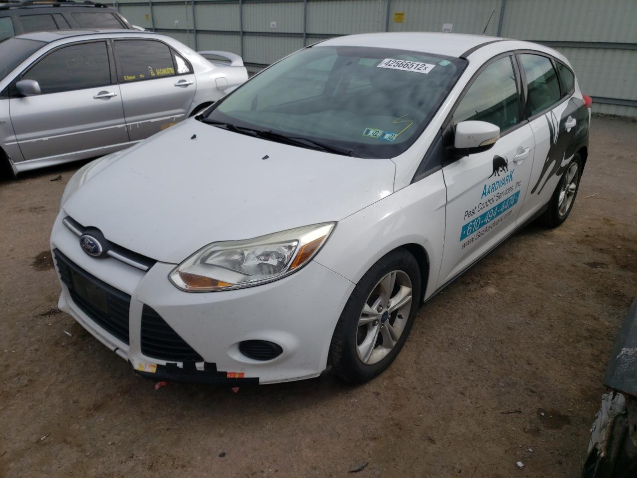 Photo 2 from auction – 2014 FORD FOCUS SE with VIN 1FADP3K25EL402394