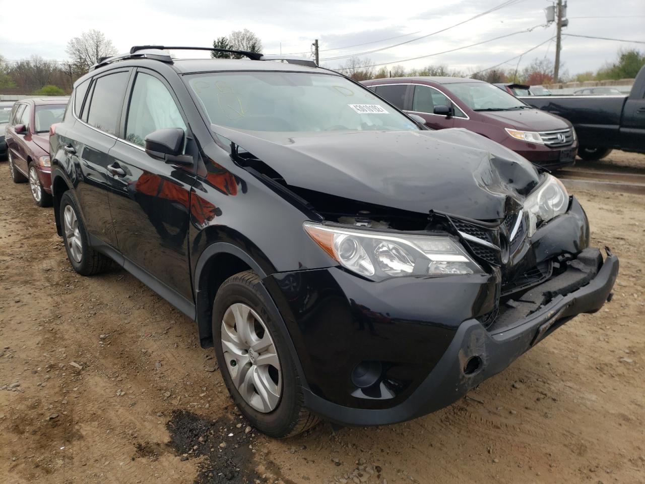 TOYOTA RAV4 LE 2015 with VIN 2T3BFREV3FW355409 - Photo from auction