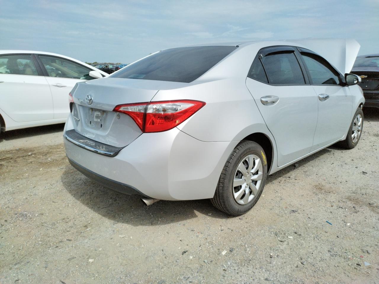 Photo 4 from auction – 2014 TOYOTA COROLLA L with VIN 2T1BURHE2EC209254