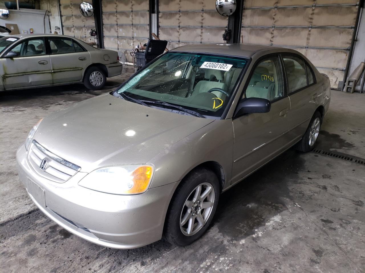 Photo 2 from auction – 2003 HONDA CIVIC LX with VIN 2HGES16573H552718