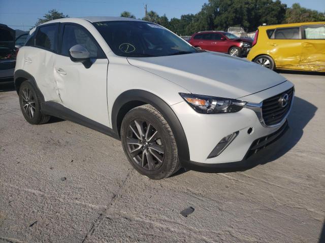 MAZDA CX-3 TOURI 2018 with VIN JM1DKDC71J0328184 - Photo from auction