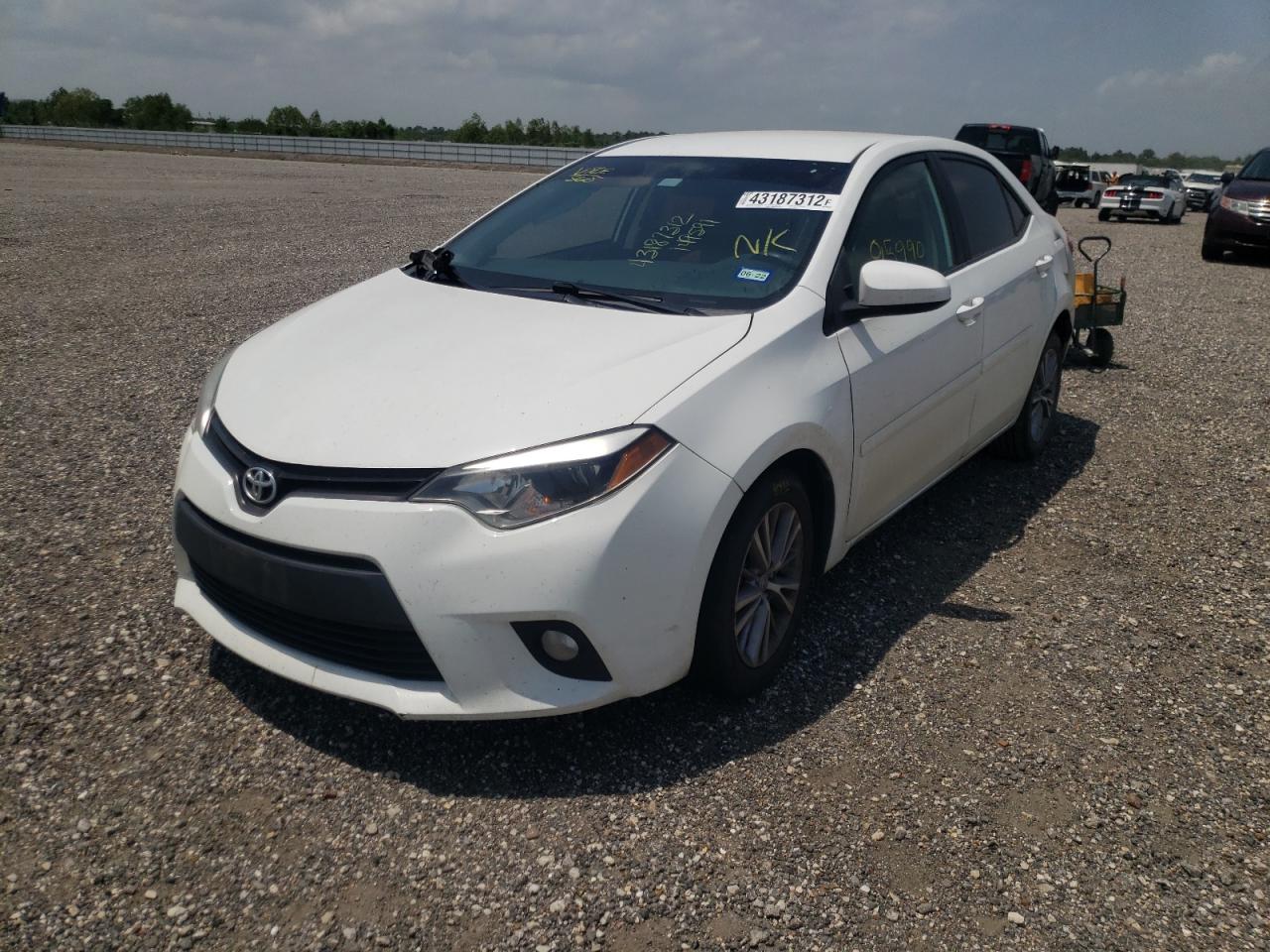Photo 2 from auction – 2014 TOYOTA COROLLA L with VIN 5YFBURHE4EP149591