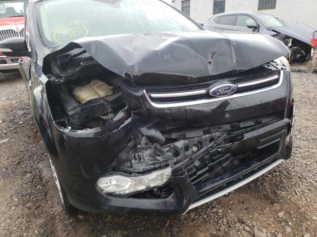 Photo 9 from auction – 2014 FORD ESCAPE TIT with VIN 1FMCU9J98EUB20000