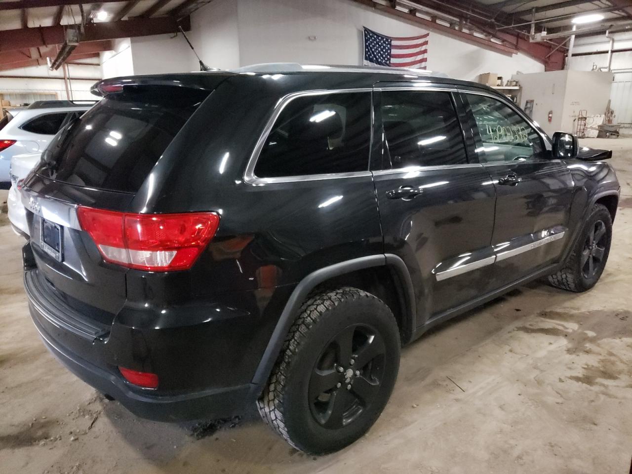Photo 4 from auction – 2012 JEEP GRAND CHER with VIN 1C4RJFAT9CC229215