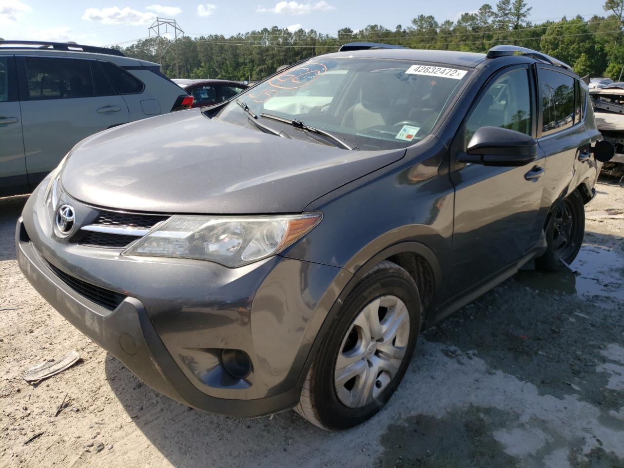 Photo 2 from auction – 2014 TOYOTA RAV4 LE with VIN JTMZFREV7EJ002036