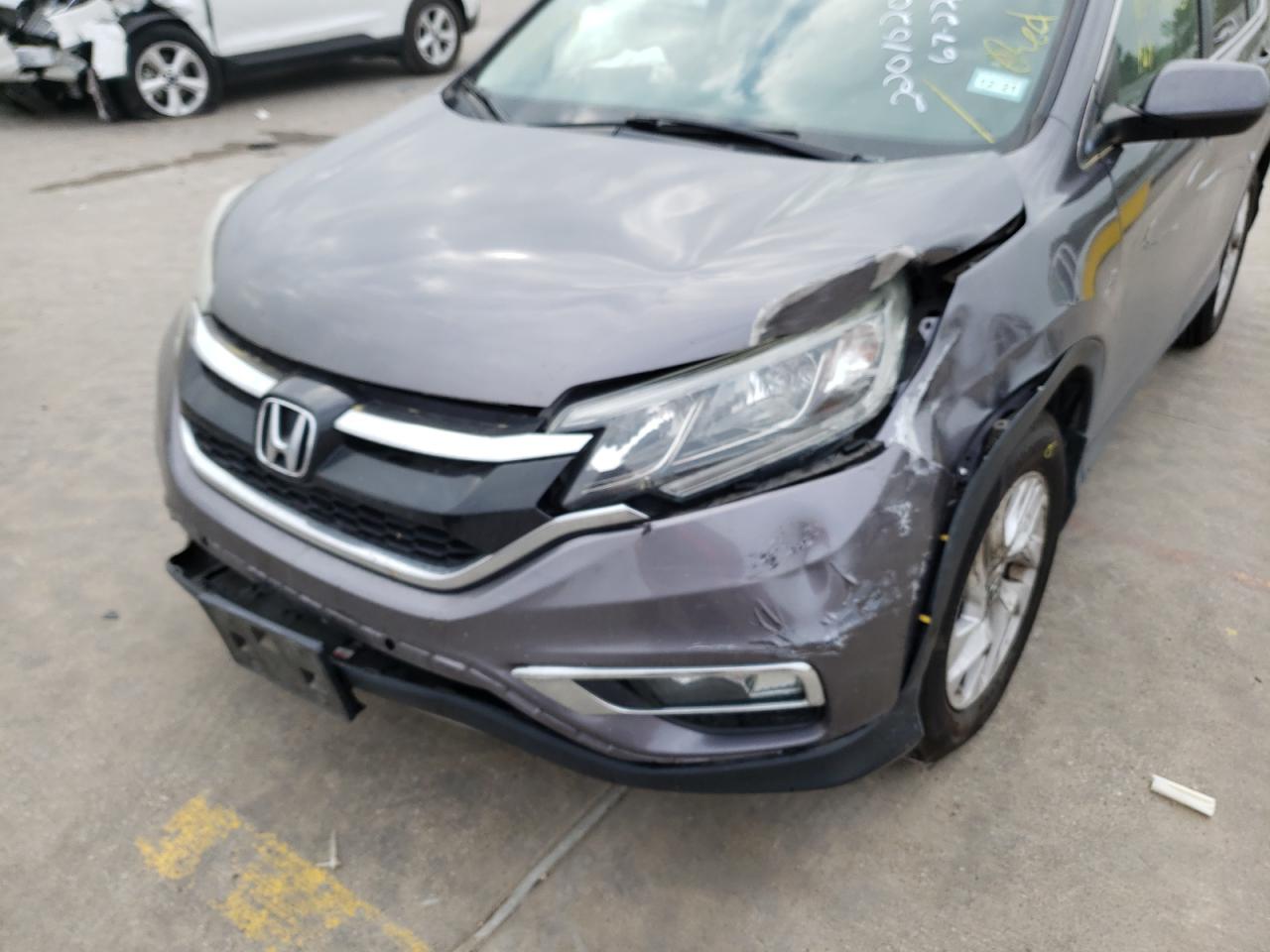 Photo 9 from auction – 2015 HONDA CR-V EX with VIN 2HKRM3H55FH502916