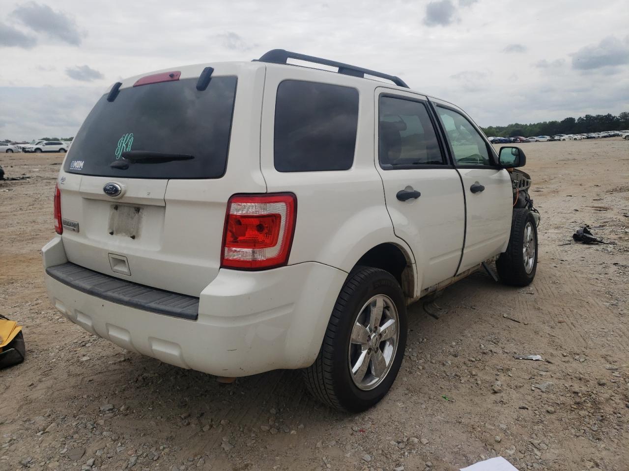 Photo 4 from auction – 2011 FORD ESCAPE XLT with VIN 1FMCU0D7XBKC21648