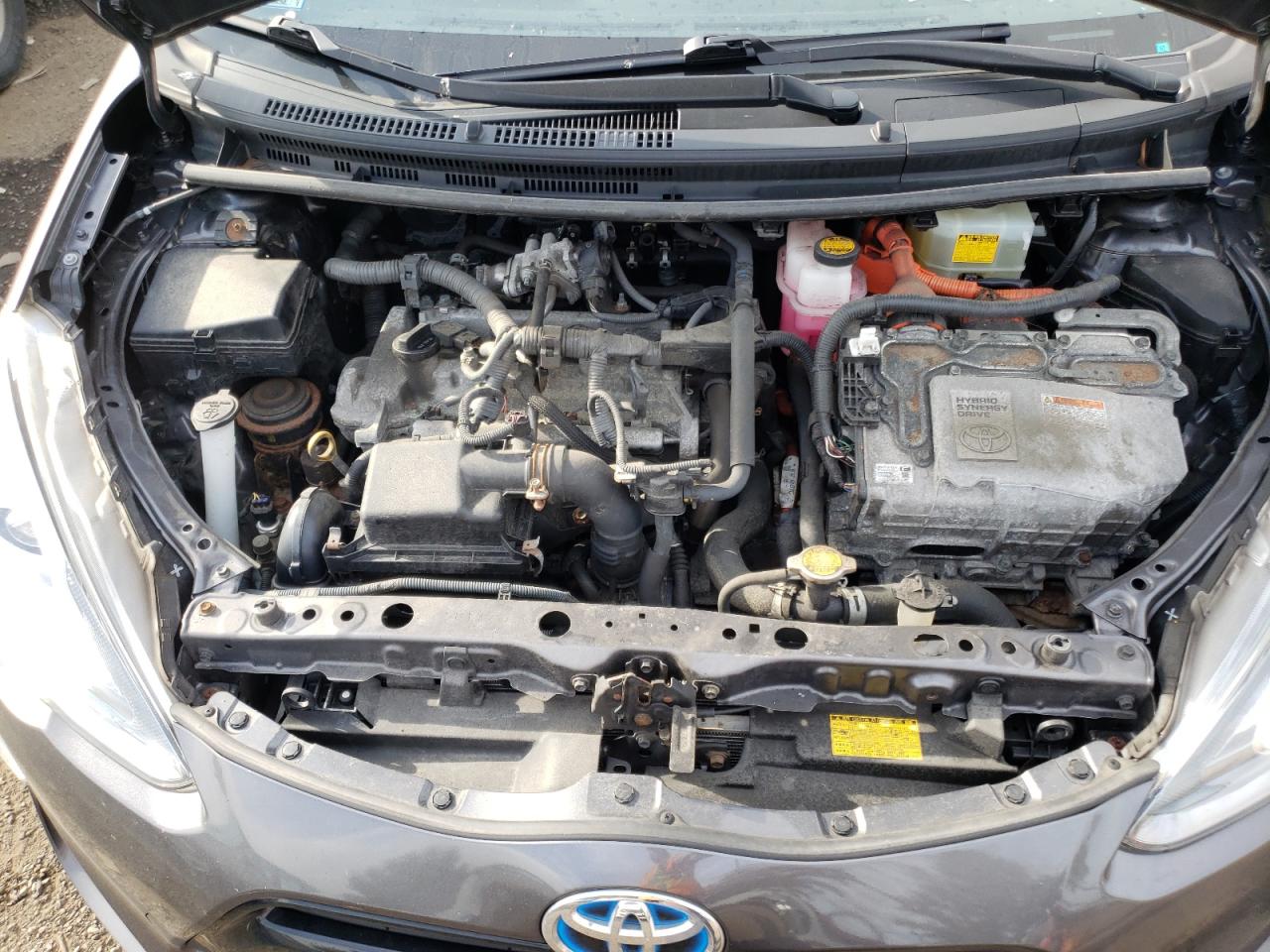 Photo 7 from auction – 2015 TOYOTA PRIUS C with VIN JTDKDTB37F1582381