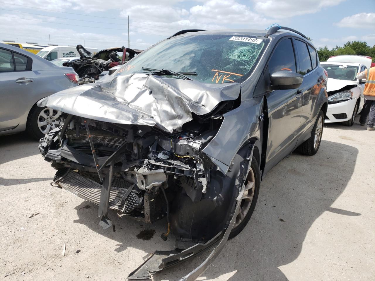 Photo 2 from auction – 2014 FORD ESCAPE SE with VIN 1FMCU0GX2EUC34933