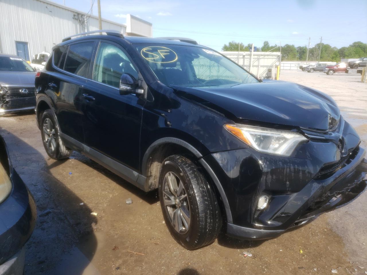 TOYOTA RAV4 XLE 2017 with VIN 2T3WFREV5HW353617 - Photo from auction