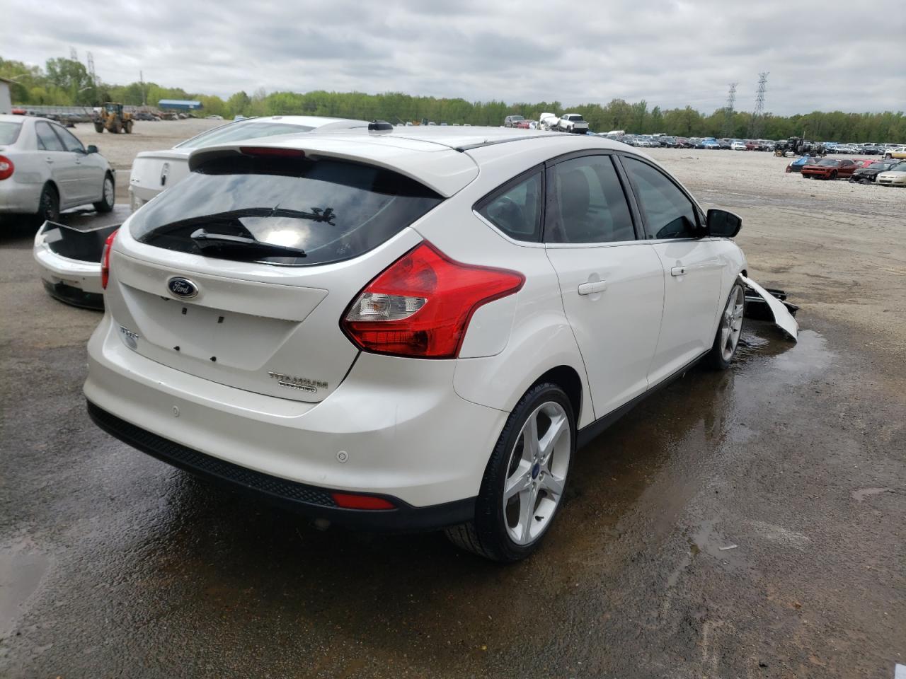 Photo 4 from auction – 2014 FORD FOCUS TITA with VIN 1FADP3N29EL396028