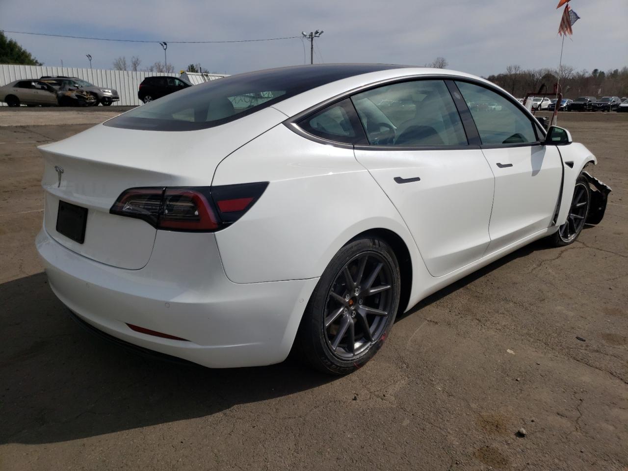 Photo 4 from auction – 2021 TESLA MODEL 3 with VIN 5YJ3E1EAXMF915953