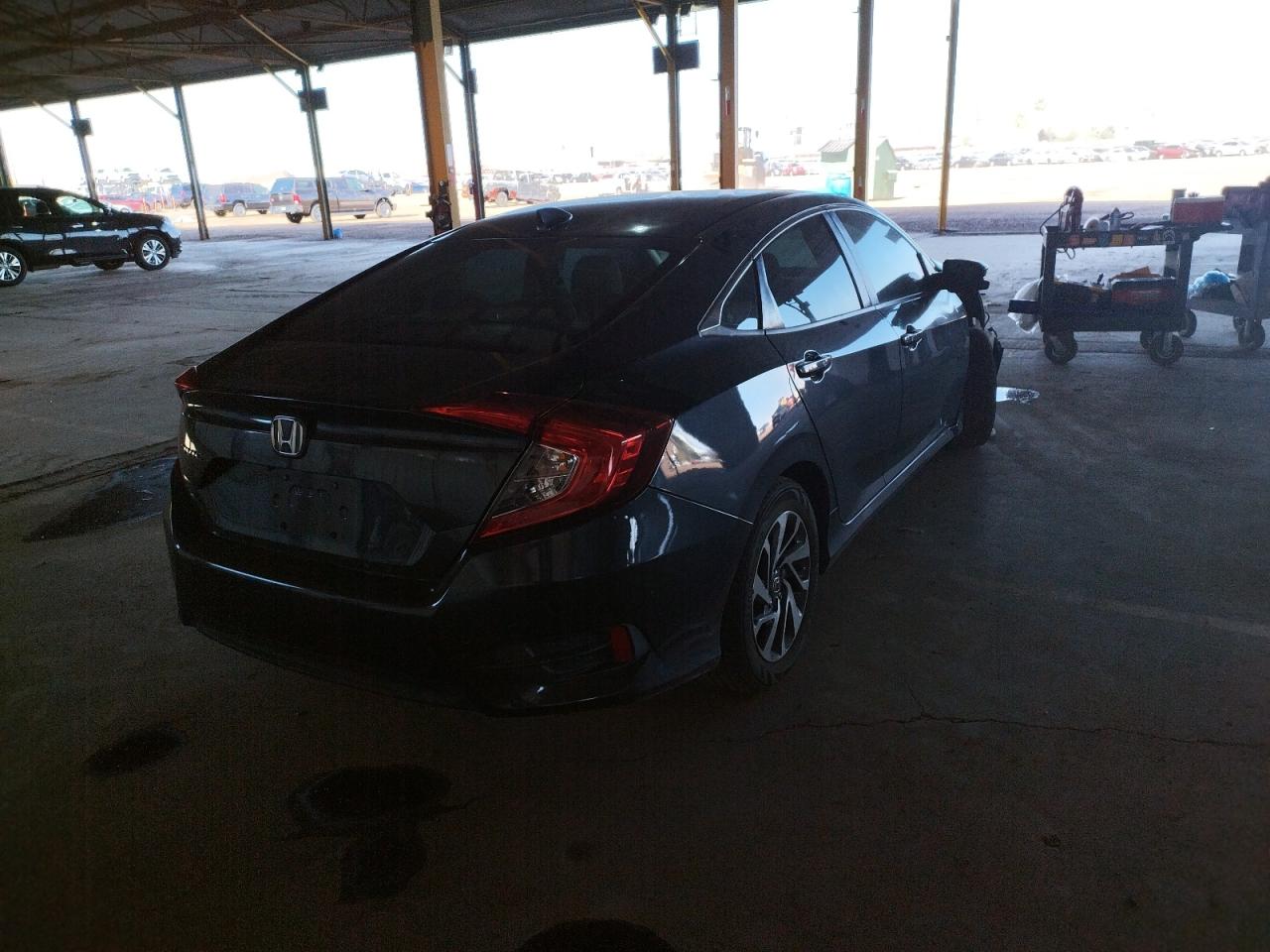 Photo 4 from auction – 2017 HONDA CIVIC EX with VIN 19XFC2F74HE006131