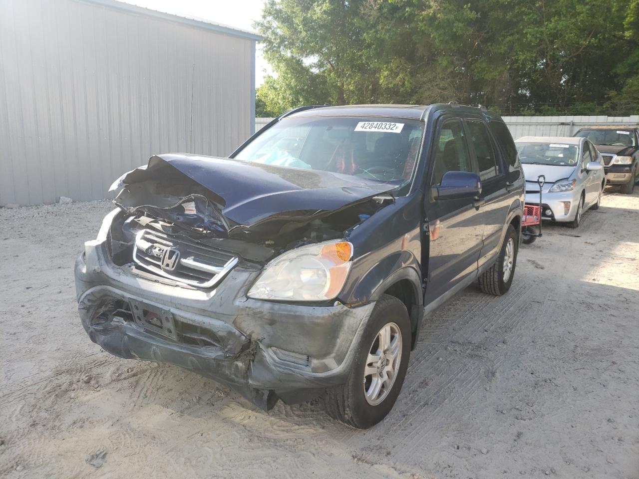 Photo 2 from auction – 2002 HONDA CR-V EX with VIN JHLRD77812C067131