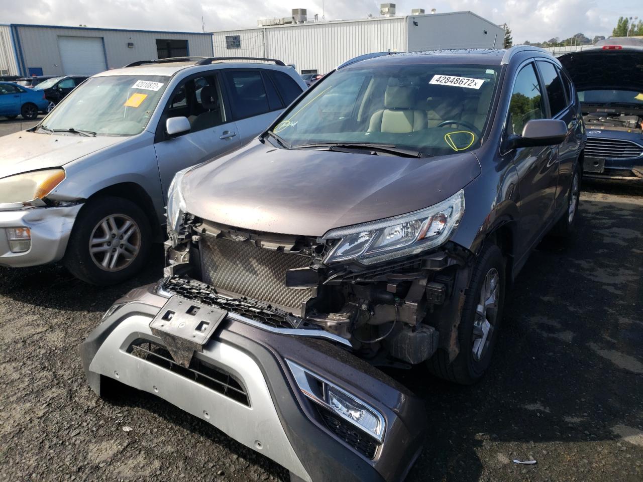 Photo 2 from auction – 2016 HONDA CR-V EXL with VIN 2HKRM4H7XGH724070