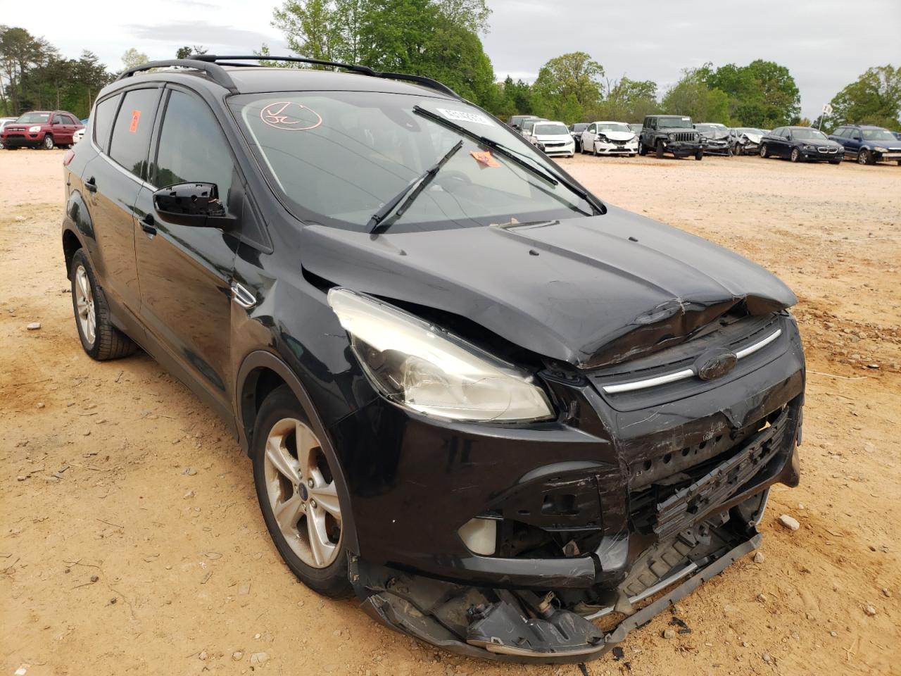 FORD ESCAPE SE 2014 with VIN 1FMCU9GX5EUA26811 - Photo from auction