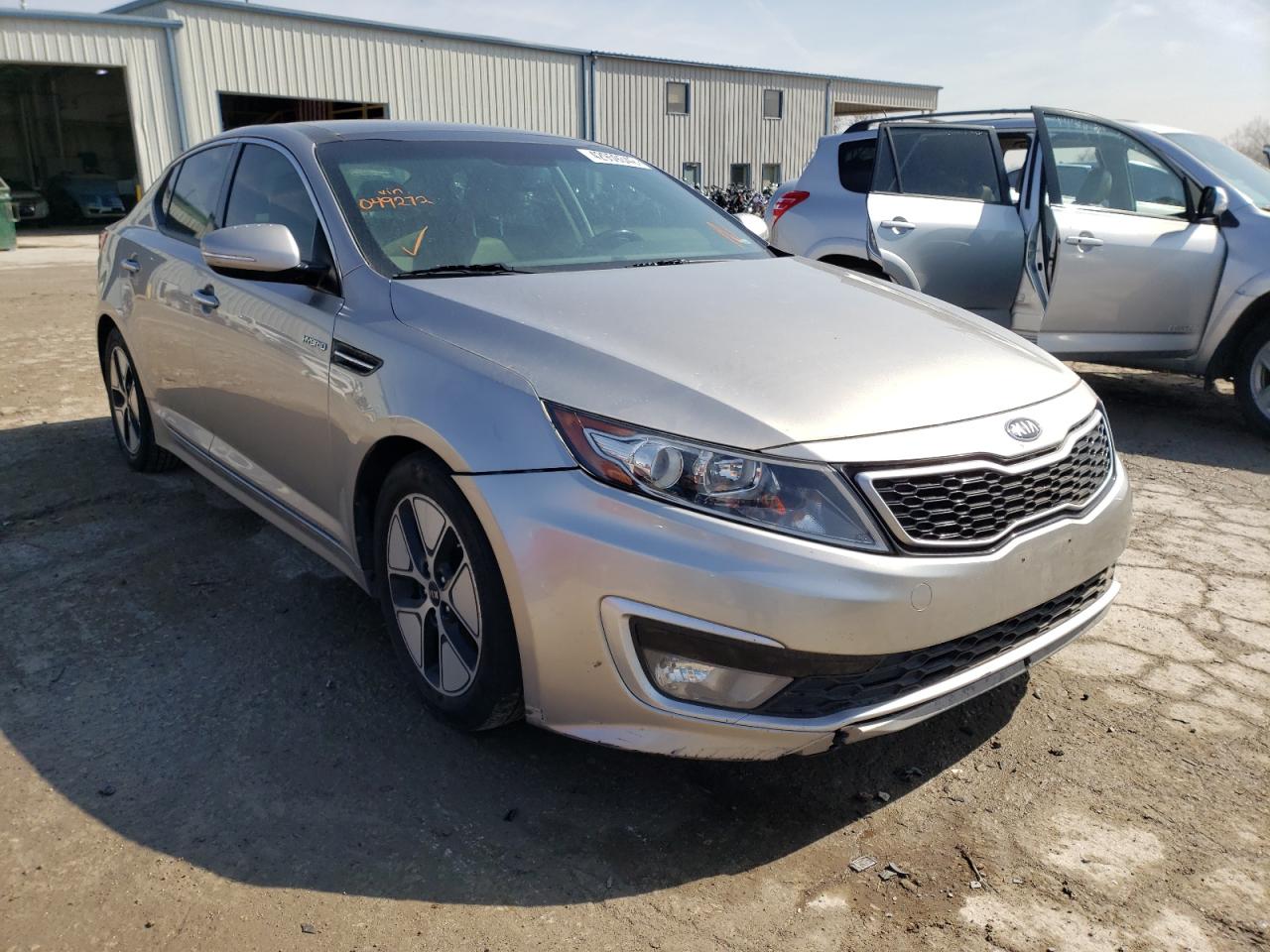 KIA OPTIMA HYB 2013 with VIN KNAGM4ADXD5049272 - Photo from auction