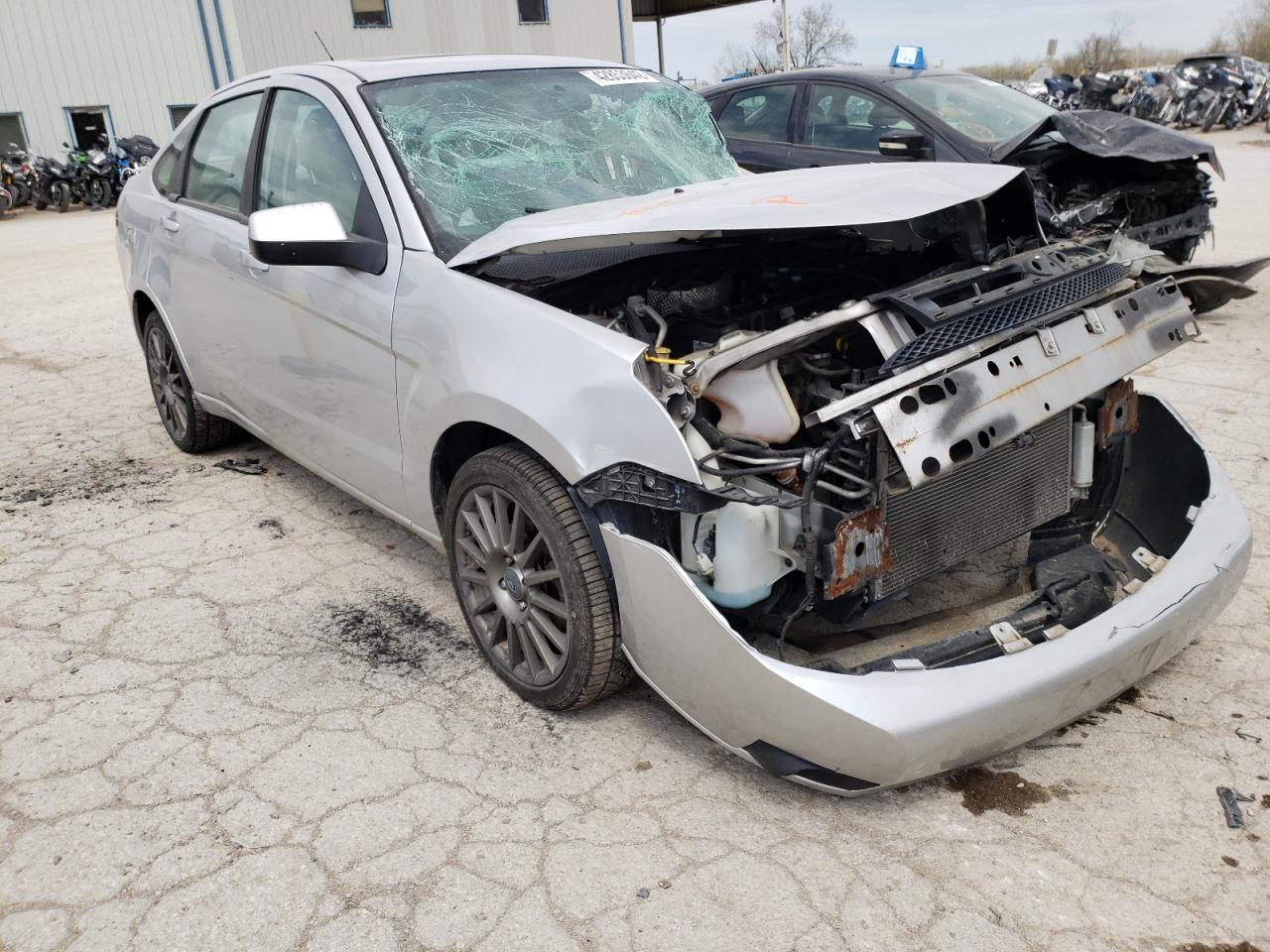 FORD FOCUS SES 2011 with VIN 1FAHP3GN8BW136528 - Photo from auction