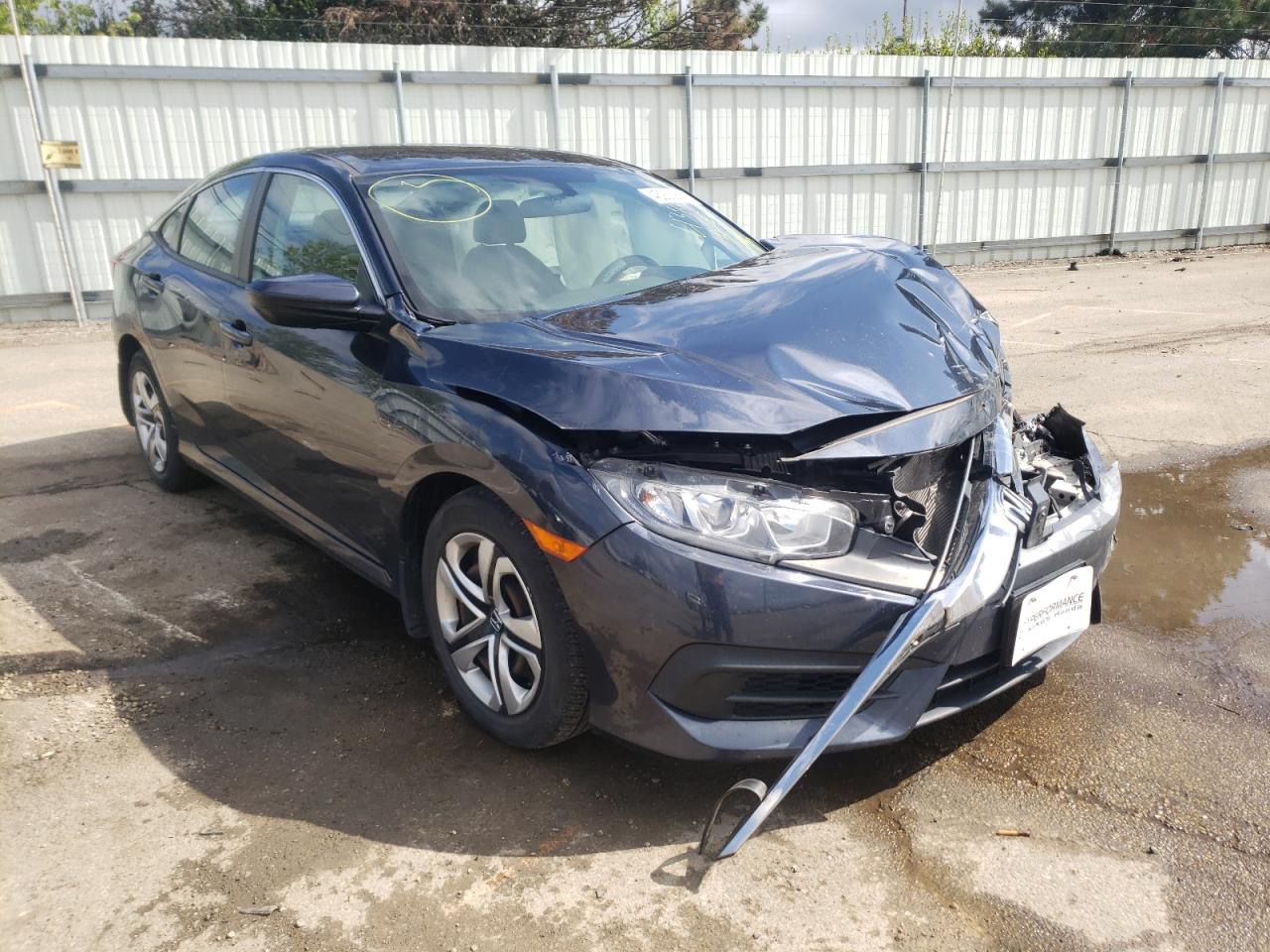 HONDA CIVIC LX 2017 with VIN 19XFC2F50HE042199 - Photo from auction