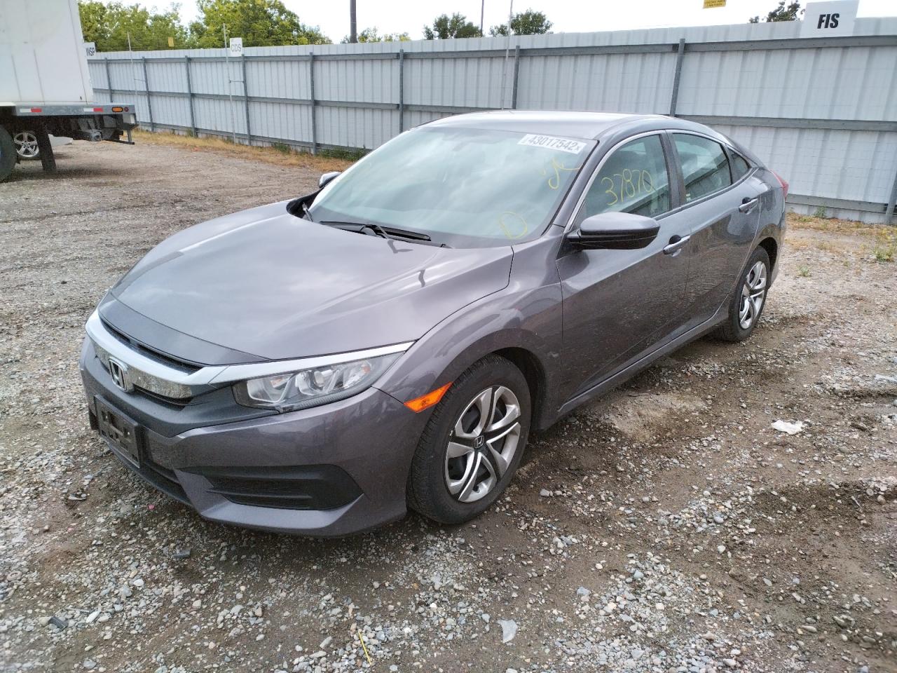 Photo 14 from auction – 2018 HONDA CIVIC LX with VIN 19XFC2F59JE203185