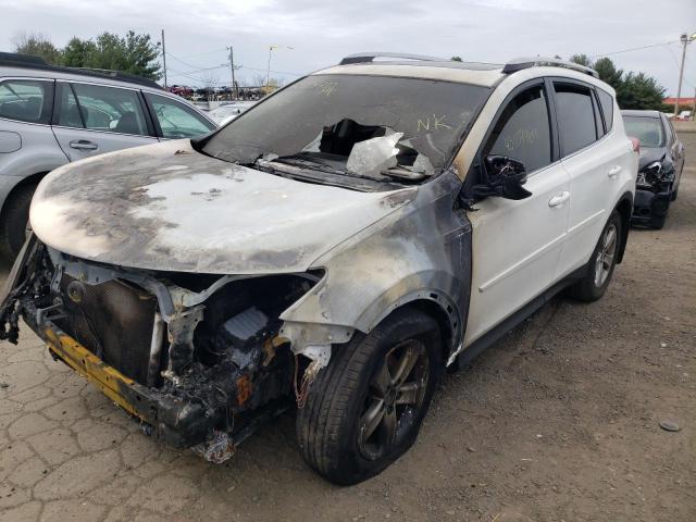 Photo 2 from auction – 2015 TOYOTA RAV4 XLE with VIN JTMRFREVXFD157440