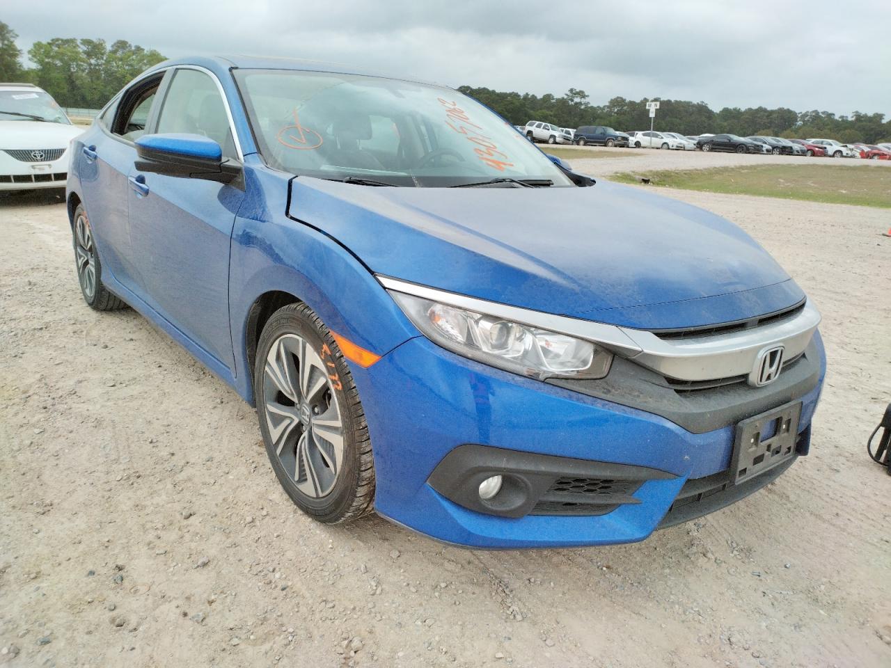 HONDA CIVIC EXL 2018 with VIN JHMFC1F75JX012292 - Photo from auction