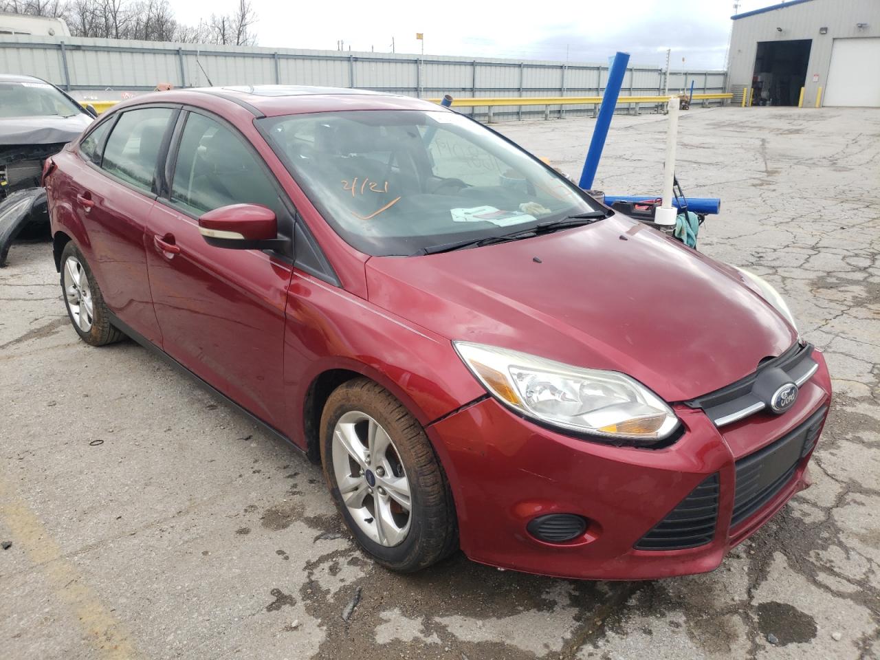 FORD FOCUS SE 2013 with VIN 1FADP3F21DL324723 - Photo from auction