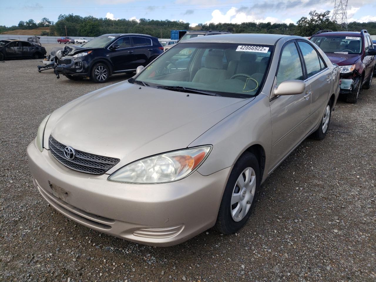 Photo 2 from auction – 2004 TOYOTA CAMRY LE with VIN 4T1BE32K24U875911